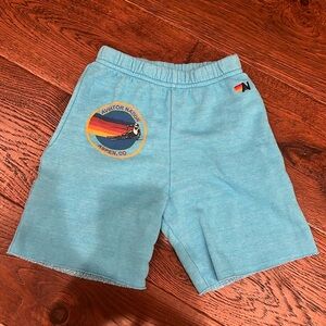 Aviator Nation youth unisex sweatshorts. Neon Blue. Size 8